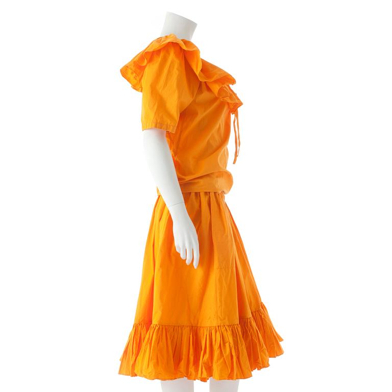 YVES SAINT LAURENT, a orange cotton top and skirt from the 80s.