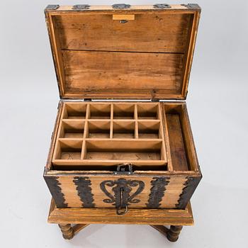 A oak baroque chest on a later leg frame.