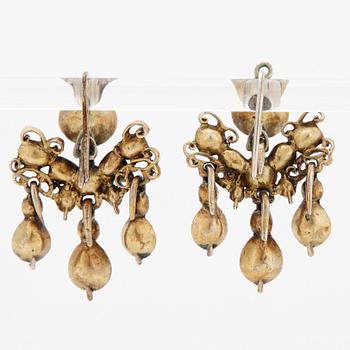 A pair of 18th century rose- and table-cut diamond earrings.