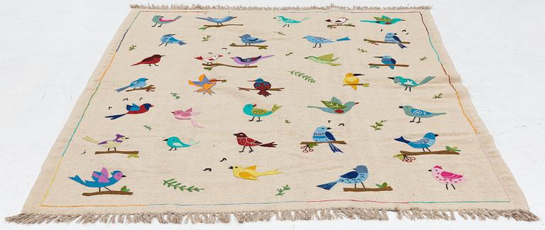 A hand-embroidered Kelim rug, c. 230 x 173 cm.
