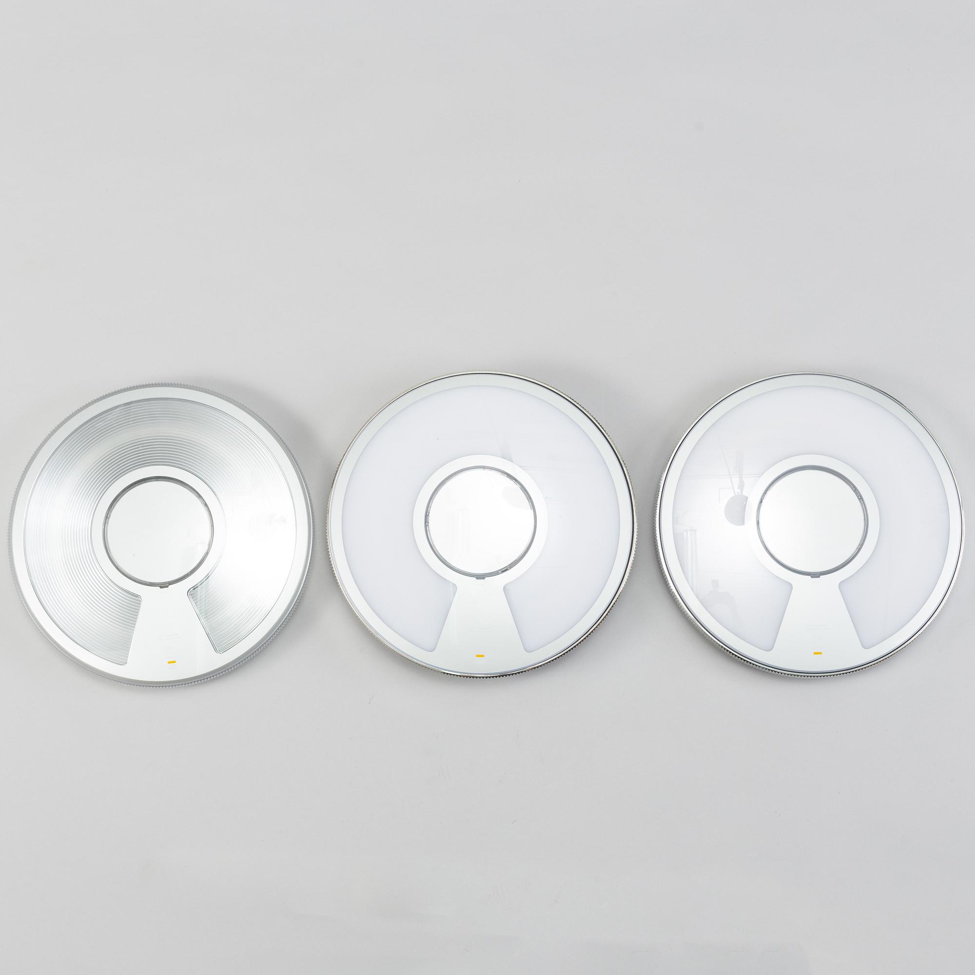 A set of three 'Light disc' wall lights by Alberto Meda & Paolo Rizzato, Luceplan.