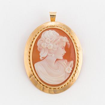 A pendant/brooch set with a shell cameo.