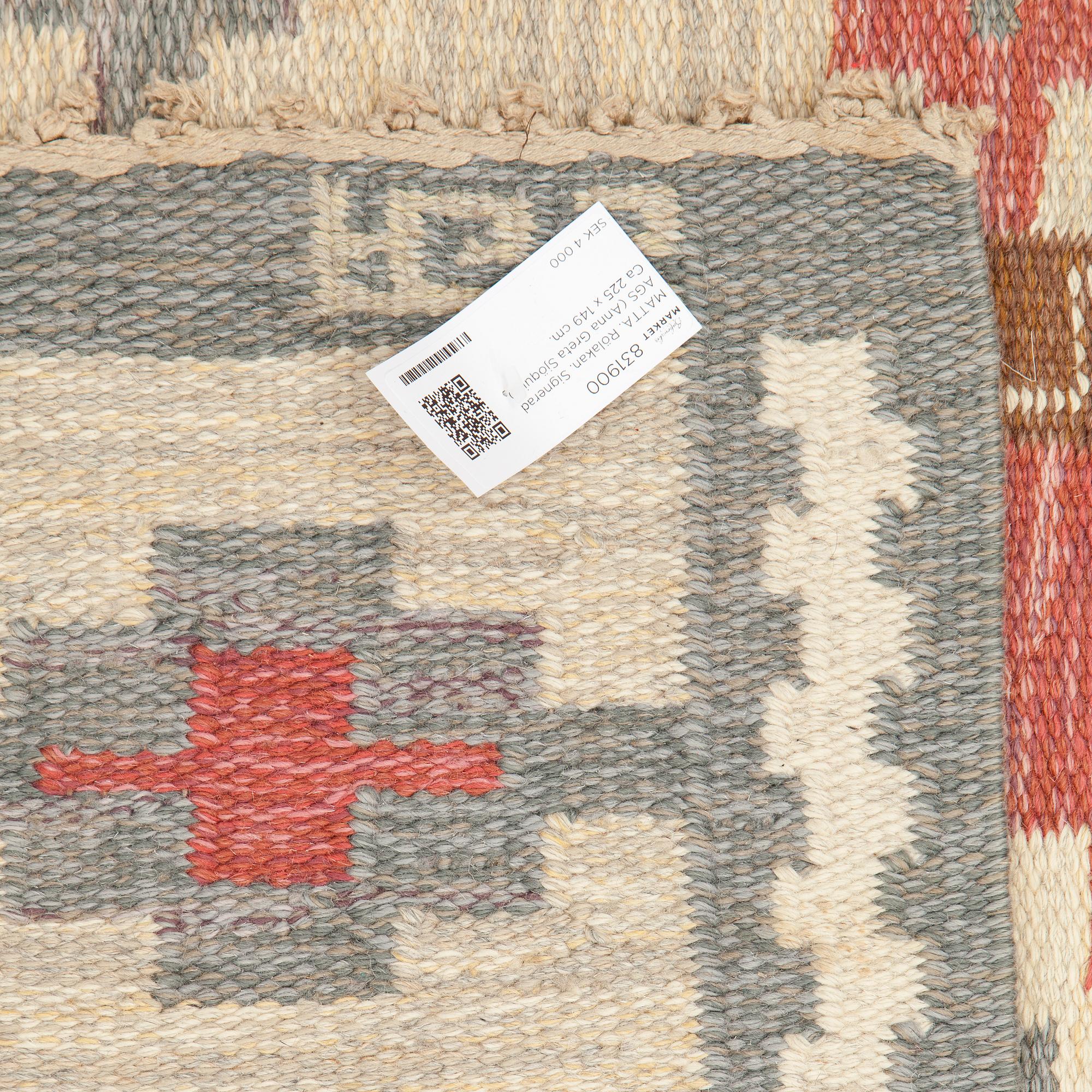 A sewdish flat weave carpet by Anna Greta Sjöquist, sigend AGS. Around 225 x 149 cm.