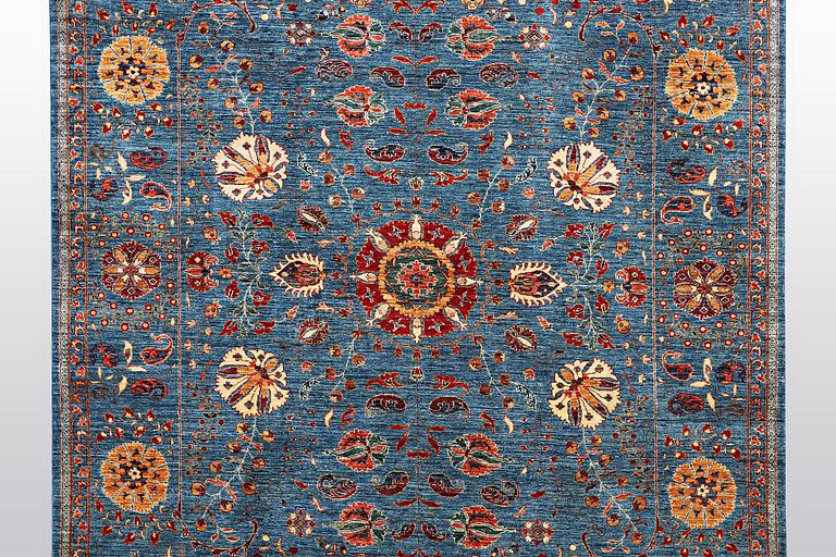 A carpet, Zeigler design, ca 312 x 254 cm.