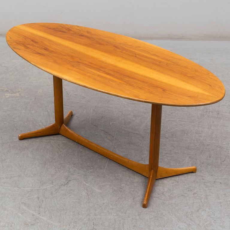 A 1959 'Plommonet' walnut coffee table by Kerstin Hörlin-Holmquist for Nordiska Kompaniet.