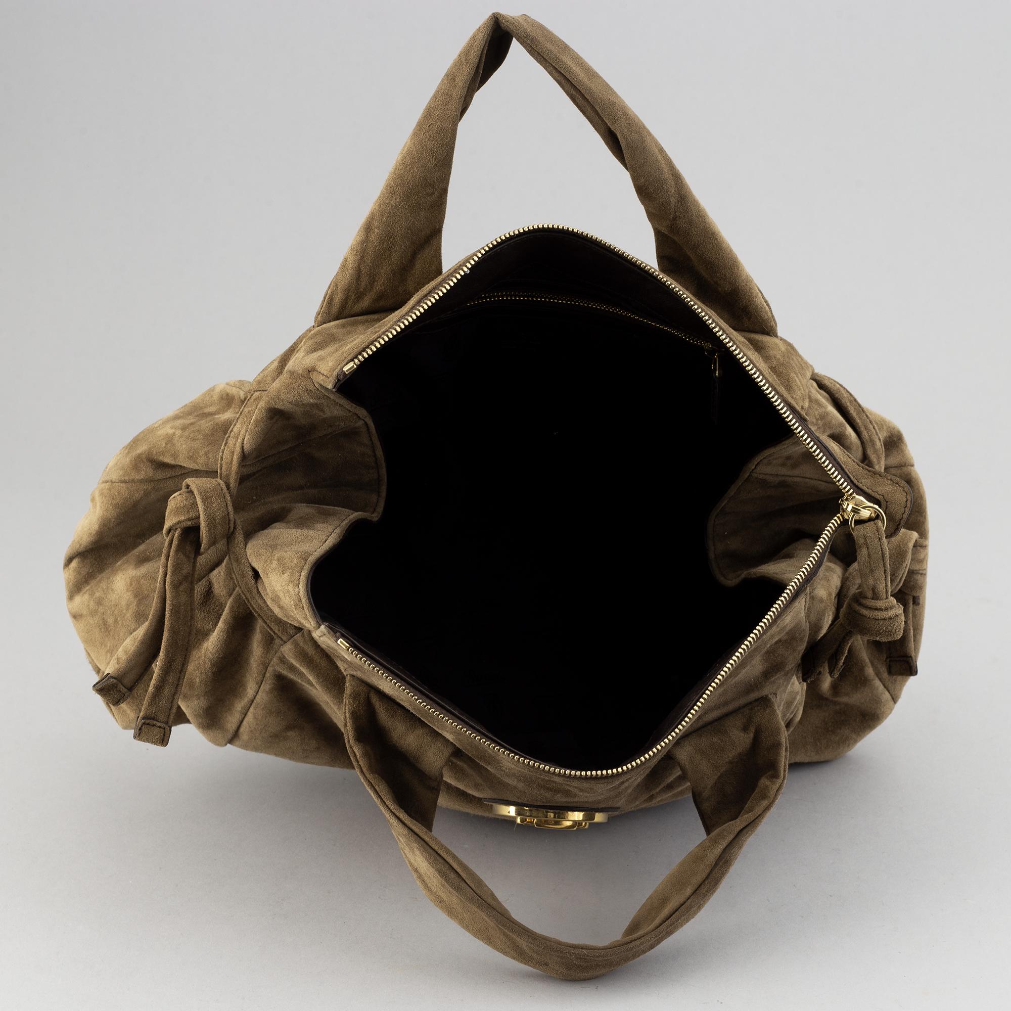 Gucci, a suede bag.