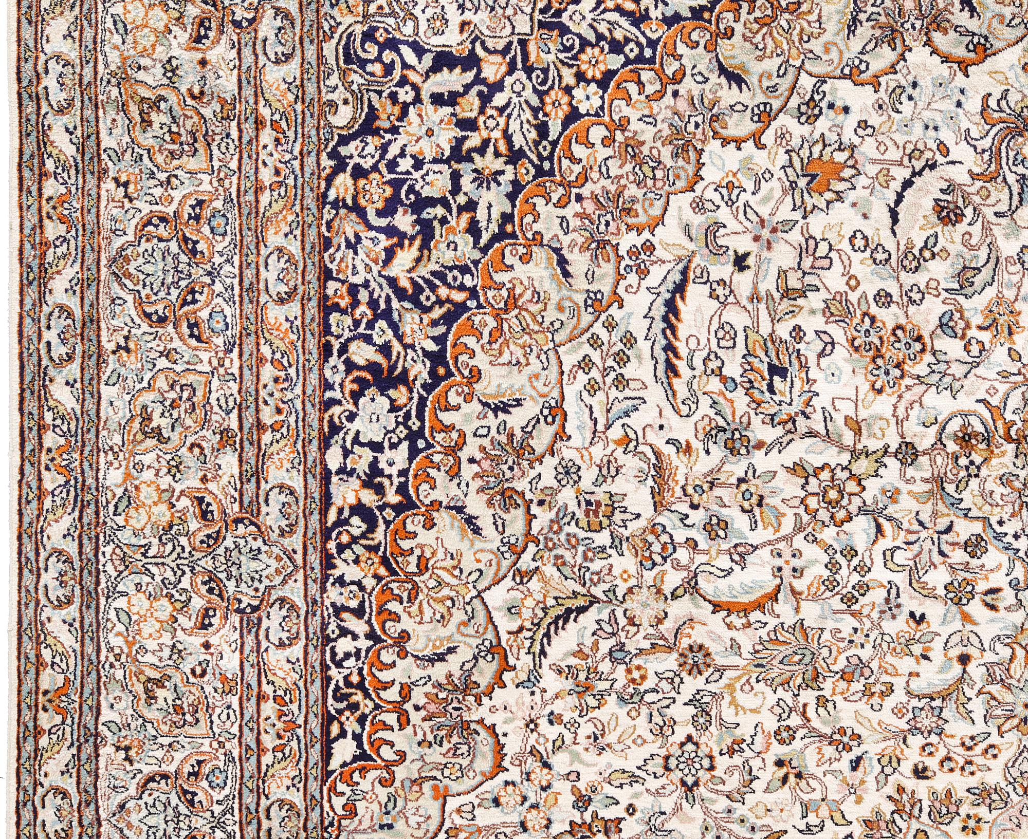 A silk Kashmir carpet, approx. 300 x 200 cm.