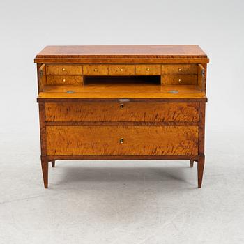 A birch veneered chest of drawers, 19th Century.