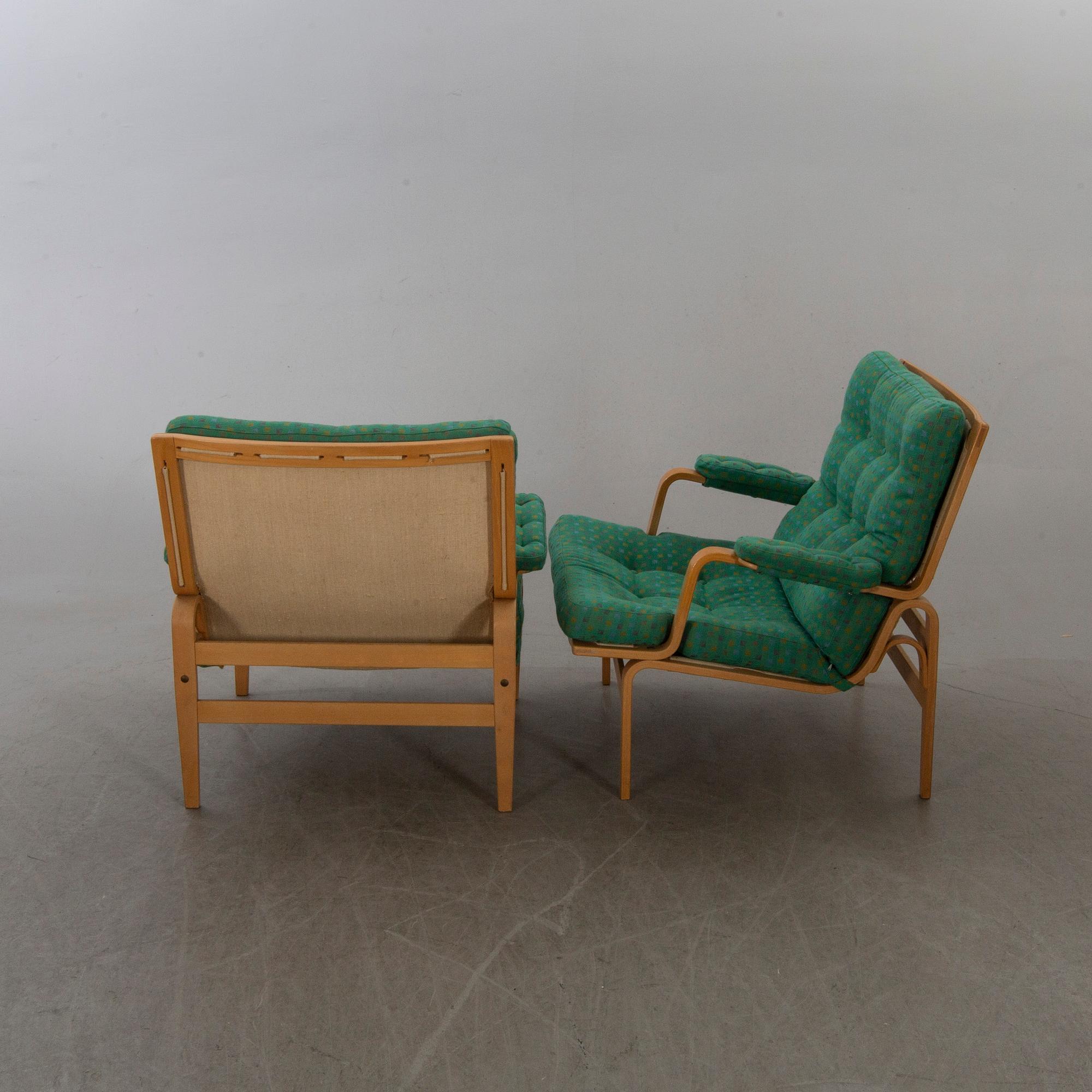 BRUNO MATHSSON, a pair  of easy chairs "Ingrid" for DUX.