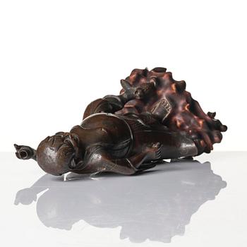 A bronze sculpture of Liu Hai, Qing dynasty, 19th century.