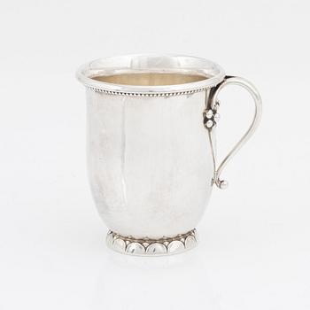 Georg Jensen, a sterling silver cup with holder, Denmark, post 1945.