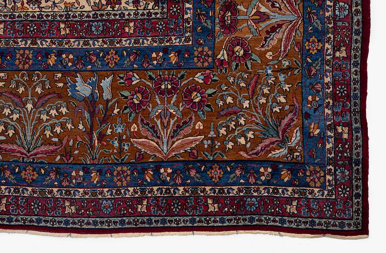 An antique 'Millefleur' Kerman Laver carpet, c. 964 x 426 cm.