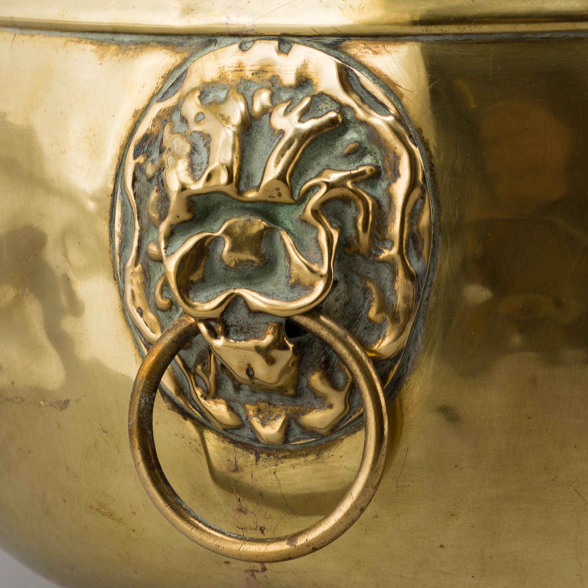 An 18th/19th century brass flower pot.