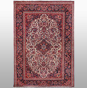 A rug, semi-antique Keshan, 217 x 134 cm.