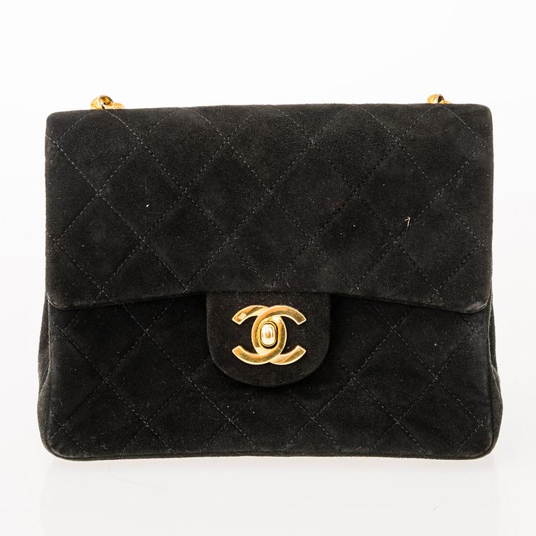 CHANEL Black Suede Mini Flap Bag.