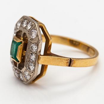 A 17-18K gold ring with an emerald and diamonds ca. 0.56 ct in total. Russia.