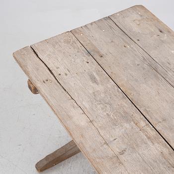 A wooden table, circa 1900.