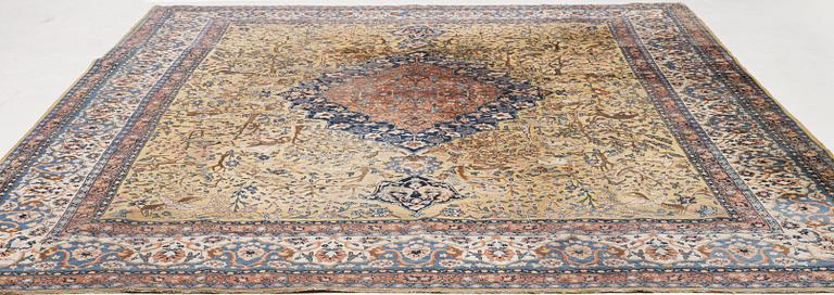 An Antique Tabriz carpet, Northwest Persia (Iran), signed Alabaf c 387 x 299 cm.