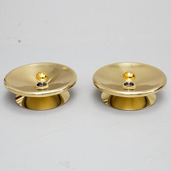 TOM DIXON, a pair of brass wall lamps.