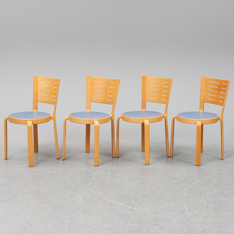 Table with four chairs, late 20th Century by Magnus Olesen.