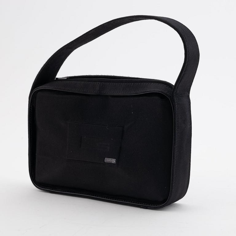 Gucci, a black satin handbag.