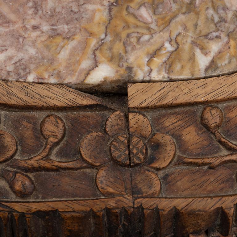 A Chinese hardwood table, around 1900.