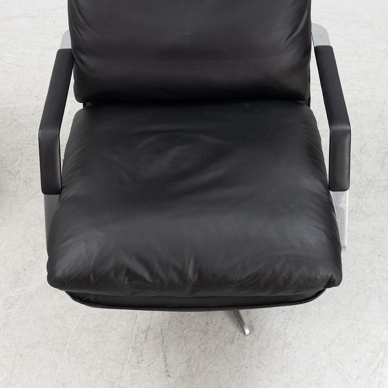 A leather 'SL 330' swivel chair and ottoman, Søren Lund, Denmark.