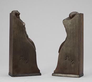 A pair of Axel Gute patinated bronze bookends, Sweden 1920's.