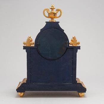 A Gustavian style mantle clock, signed C.A. Carlsson 12/12 1913 Nyköping.