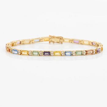 Bracelet 18K gold with multi-coloured sapphires and round brilliant-cut diamonds.