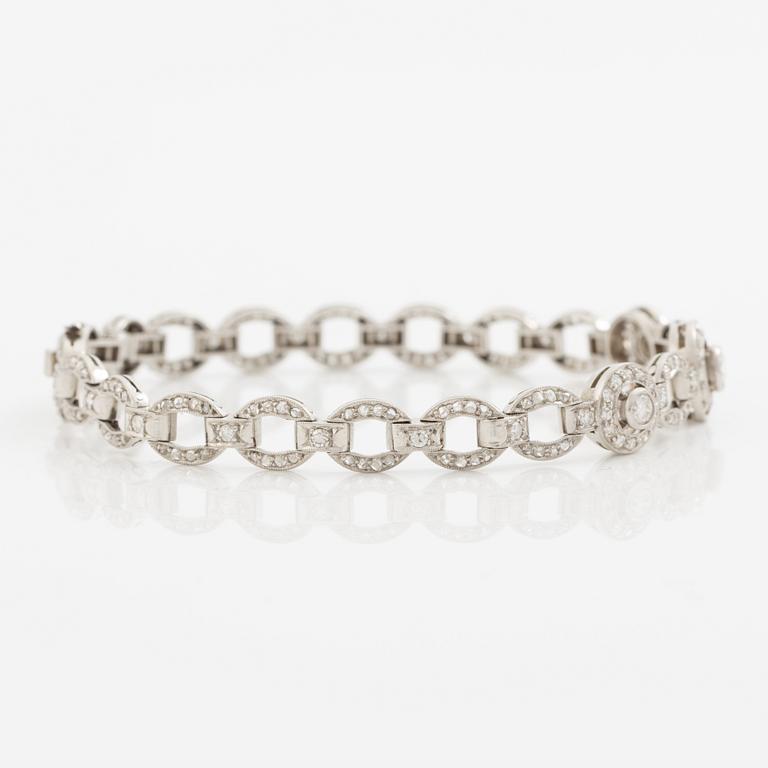Bracelet in platinum set with round brilliant, octagonal, and rose-cut diamonds.