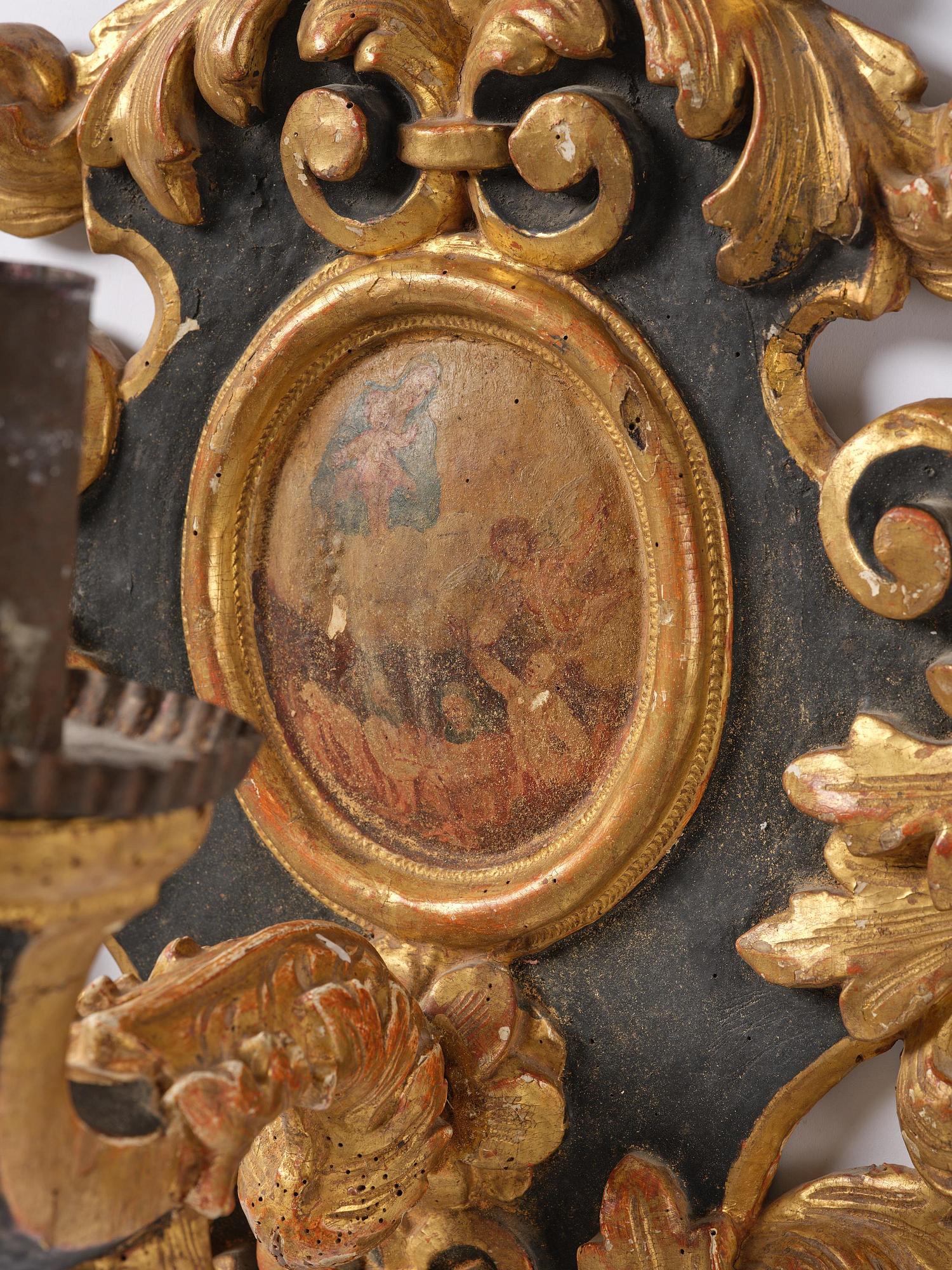 Wall sconces, a pair for one candle, Italy, 19th century, Baroque style.