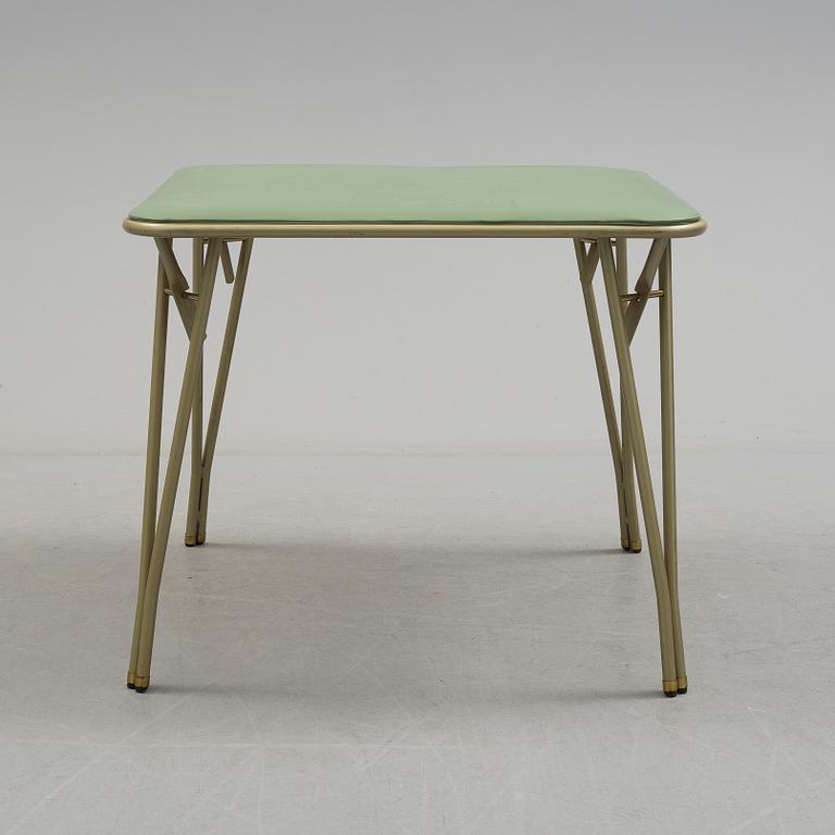 A table and four chairs by Dipetrol, second half of the 20th century.