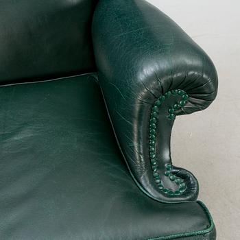 A  mid 1900s leather armchair.
