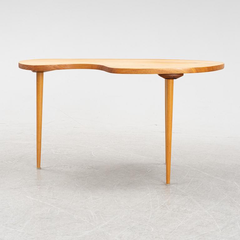 A teak coffee table, mid 20th Century.
