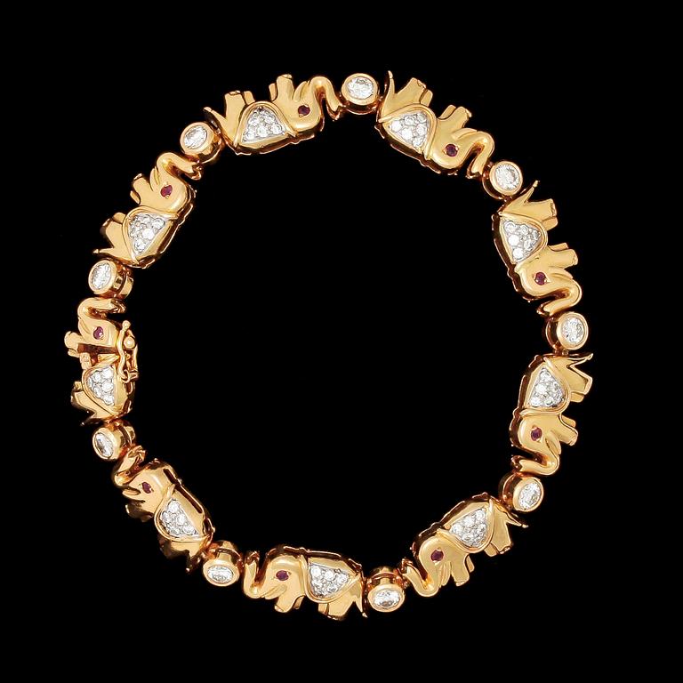 ARMBAND, i form av elefanter, med briljantslipade diamanter, tot. ca 2 ct samt rubiner.