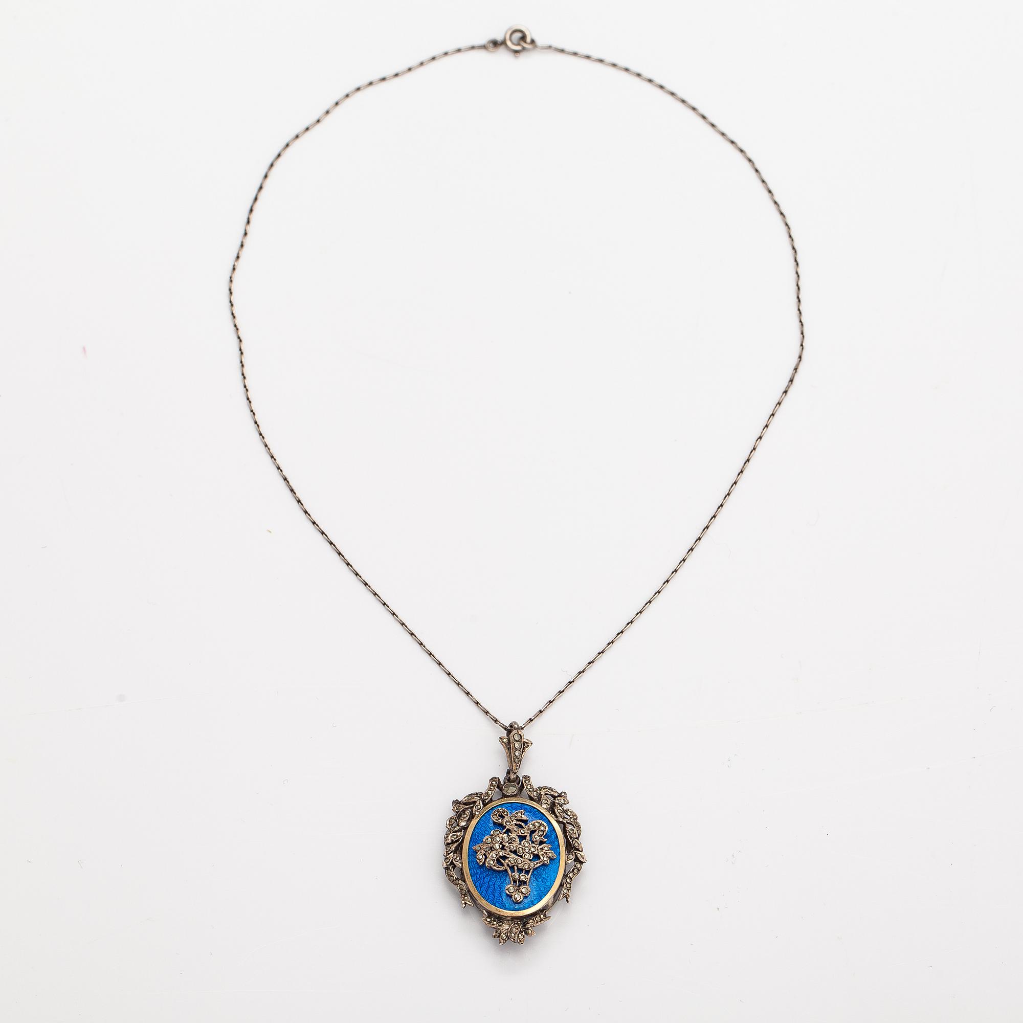 A necklace and a pair of earrings made of silver with enamel and marcasites. Paris, turn of the 20th century.