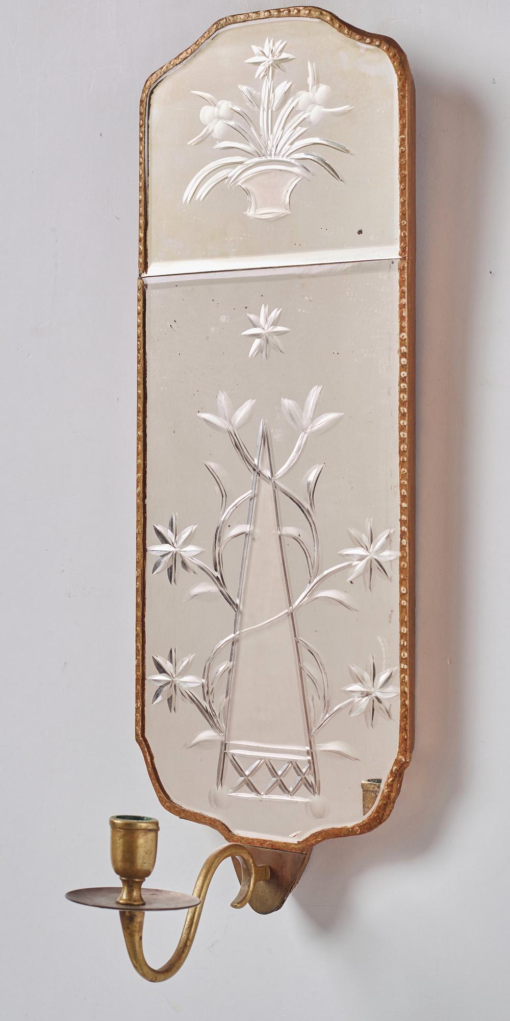 A pair of Gustavian-style giltwood and engraved glass one-light girandole mirrors, circa 1900.