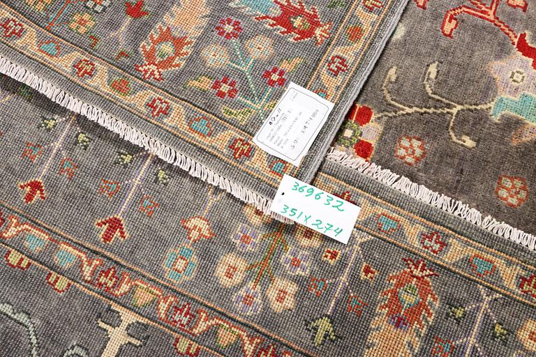 A Kazak carpet, c. 351 x 274 cm.