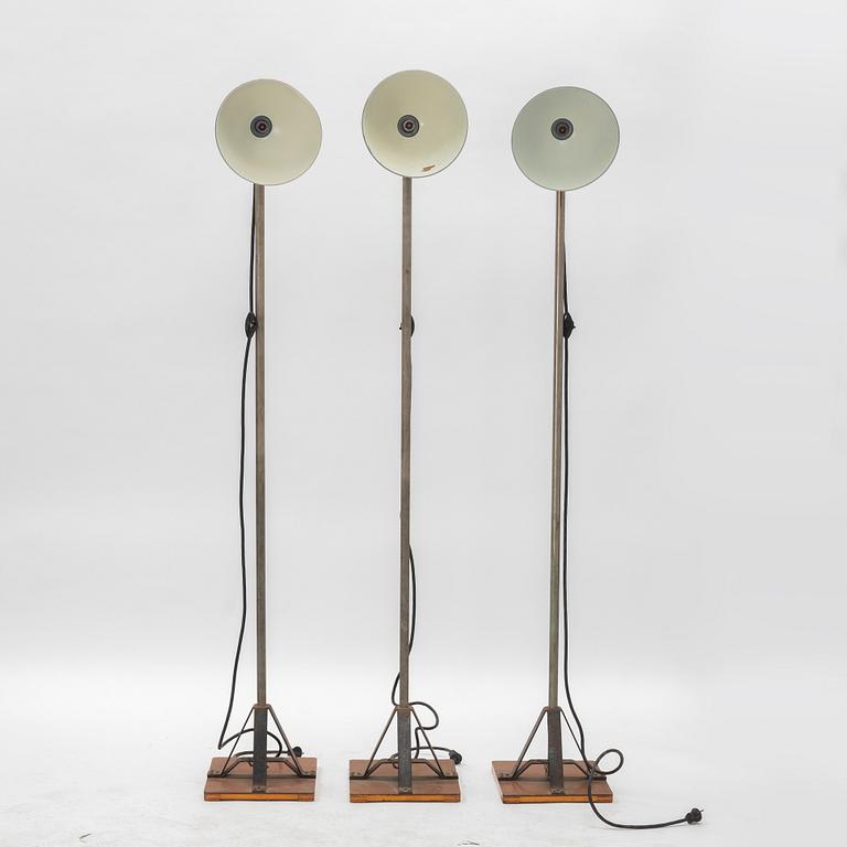 A set of three industrial lights, mid 20th Century.