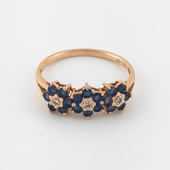 RING, med safirer och åttkantslipade diamanter.