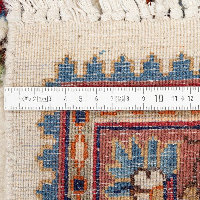 A carpet, old, Kerman, c. 312 x 224 cm.