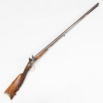 A late 18th Century flintlock shotgun.