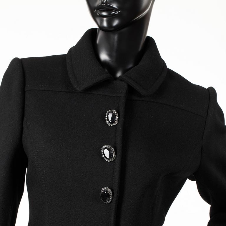 BLUMARINE, a black wool jacket.