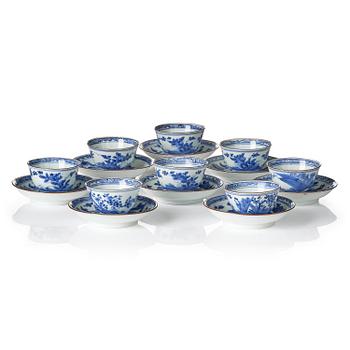 1314. A matched set of eight blue and white cups and stands, Qing dynasty, Kangxi (1662-1722).
