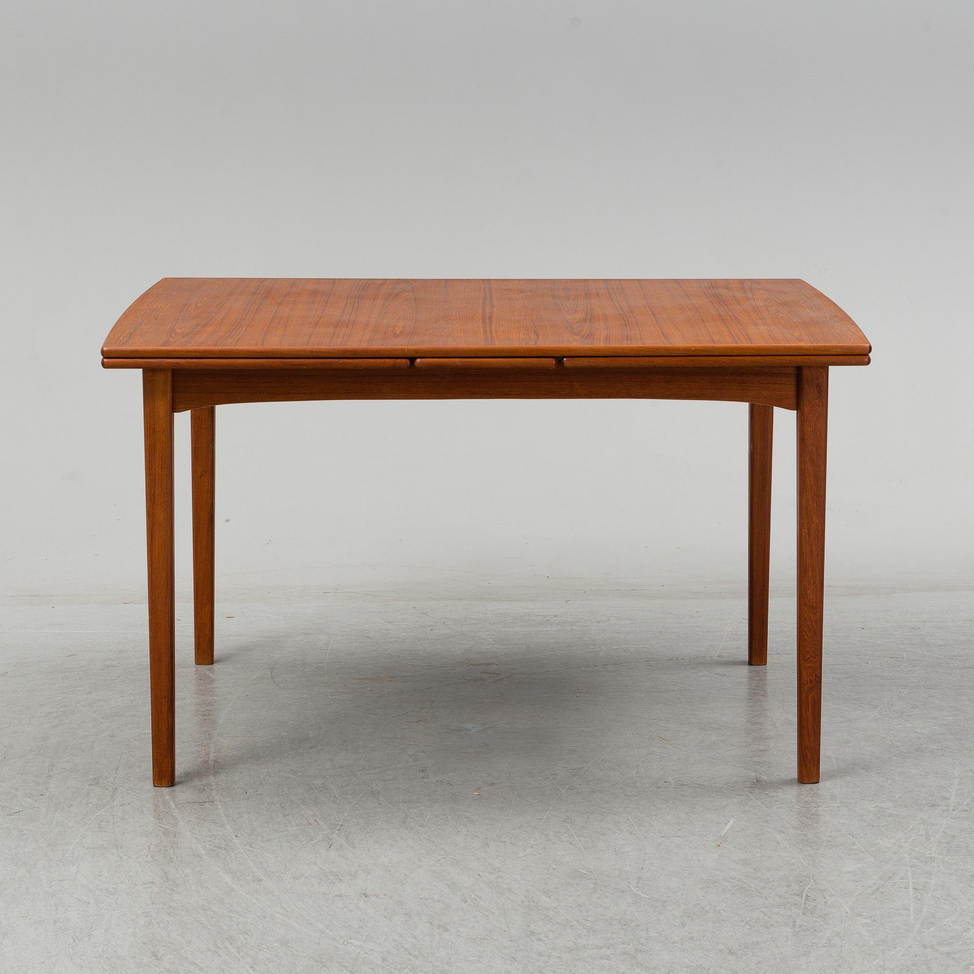 A second half of the 20th century teak dining table.