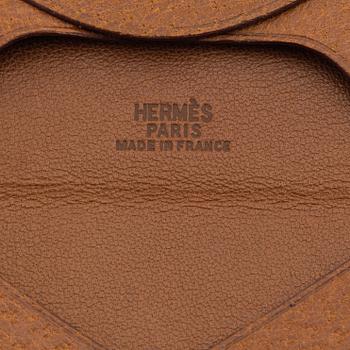 Hermès, a whisky pigskin coin purse, 1993.