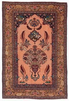 A semi-antique pictoral Kashan rug, part silk, c 207 x 134 cm.