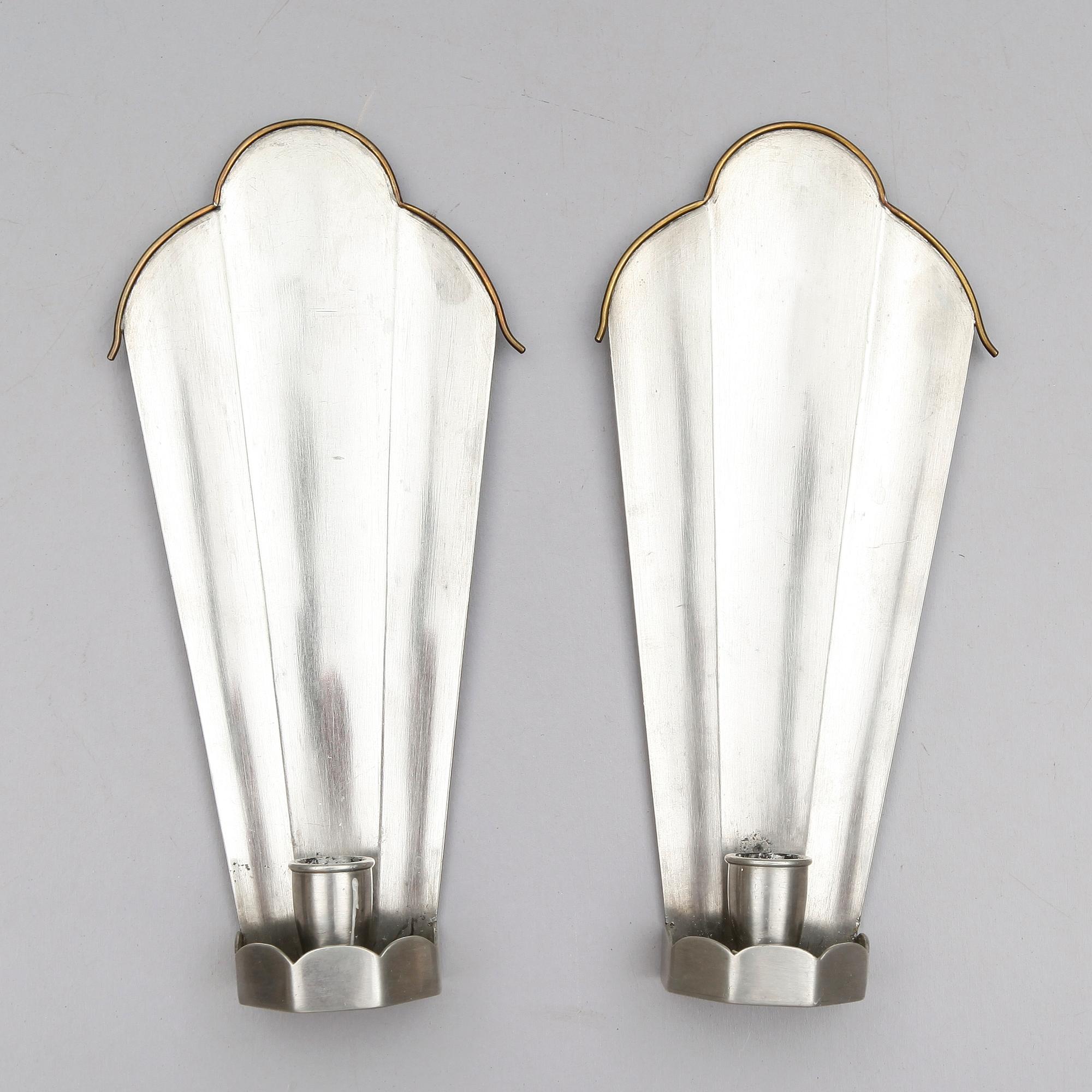 VÄGGLAMPETTER, 1 par, tenn, Firma Svenskt Tenn, stämpel 1925.