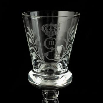 A set of 11 wine glasses and a bottle with stopper, 1900-tal.